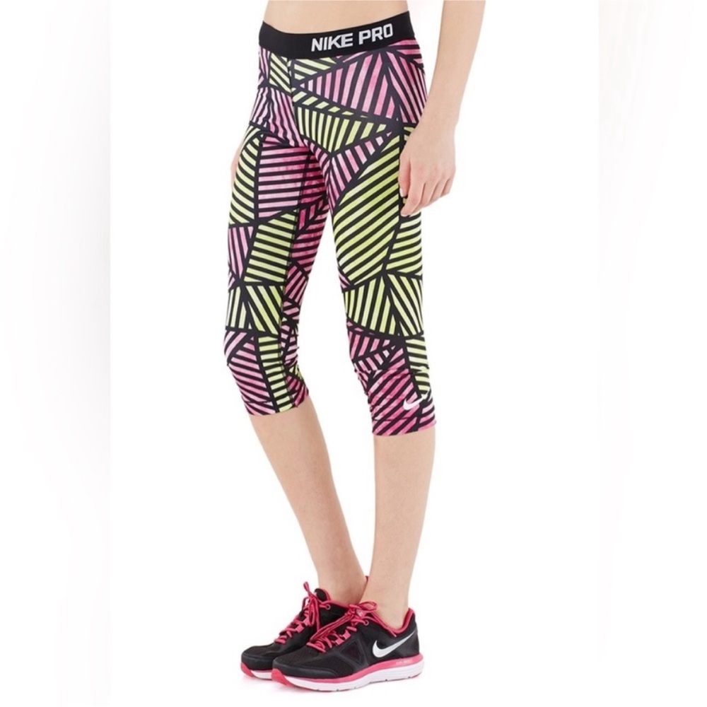 Nike Women's Dri Fit Pro Web Fade Training Capris
Pink Volt. Size S